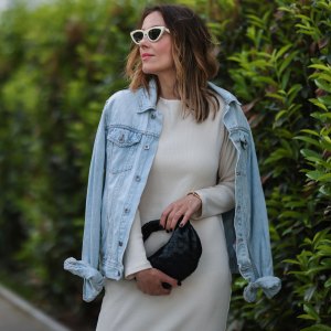 HAMBURG, GERMANY - JUNE 03: Elise Soho wearing beige Baige dress, blue Topman denim jacket and black Bottega Veneta mini leather bag on June 03, 2021 in Hamburg, Germany. (Photo by Jeremy Moeller/Getty Images)