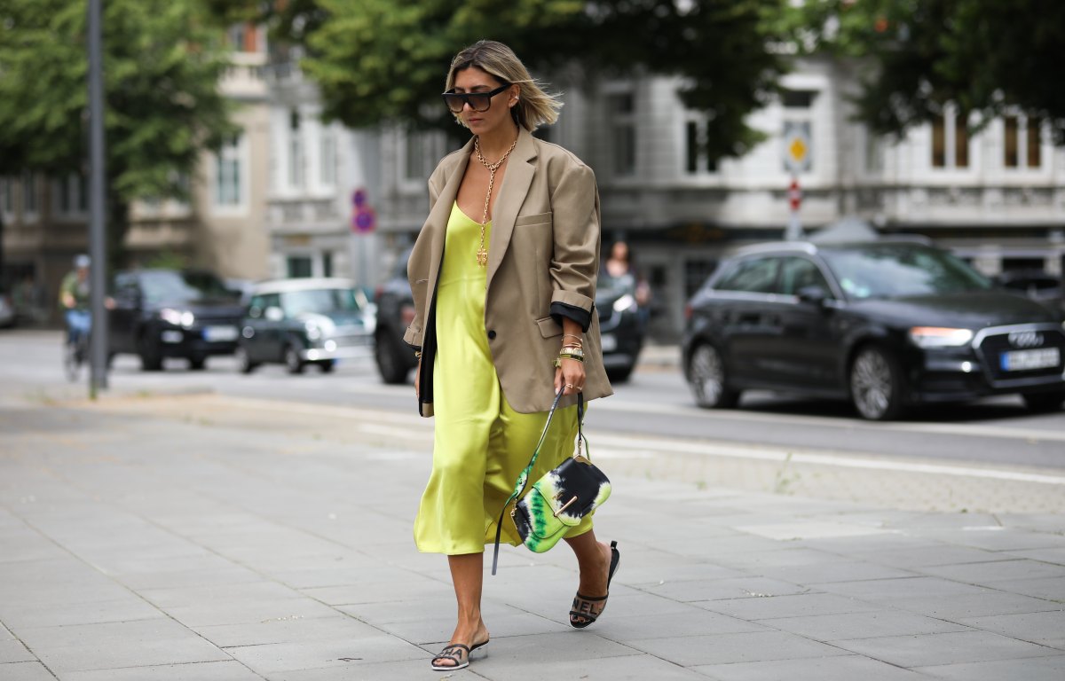 HAMBURG, GERMANY - JUNE 20: Aylin Koenig wearing The Frankie Shop blazer, Chanel shoes, Prada bag, Arket dress, Celine Sunglasses on June 20, 2019 in Hamburg, Germany. (Photo by Jeremy Moeller/Getty Images)
