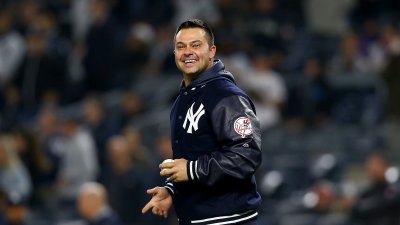 How Former Yankee Nick Swisher Embraces Being a Girl Dad Softball Coach