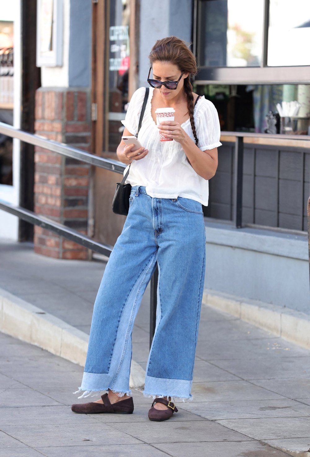 SAN DIEGO, CALIFORNIA - MARCH 22: Katie Holmes is seen wearing the Franco Sarto Oakes Mary Jane while on her way to the theatre on March 22, 2026 in San Diego, California. (Photo by Michael Simon/WireImage)
