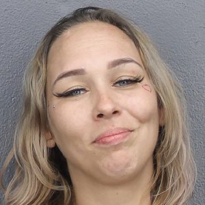 Magdalena Dybkowska Mugshot Florida Mom with Face Tattoo Grins in Mugshot After Trying to Kill Sister