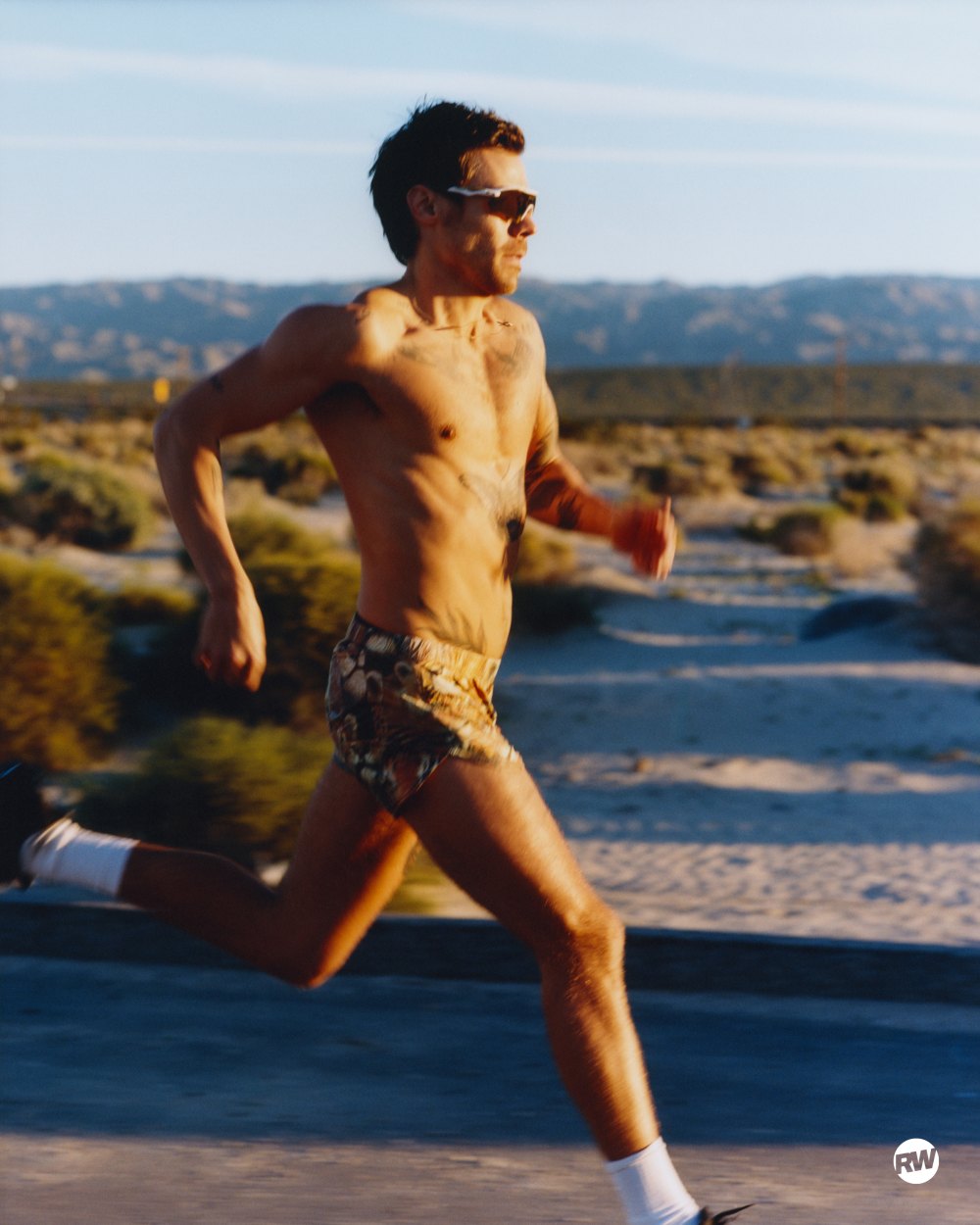 Harry Styles shirtless in 'Runner's World' magazine
