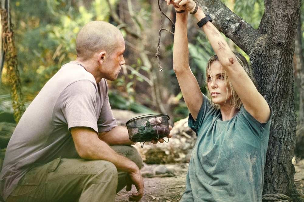 Taron Egerton and Charlize Theron in Apex