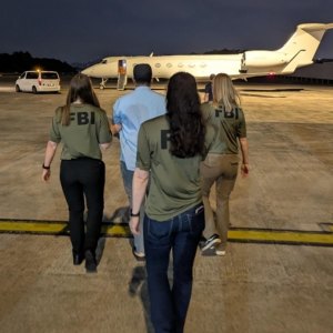 FBI agents take Zobaidul Amin into custody