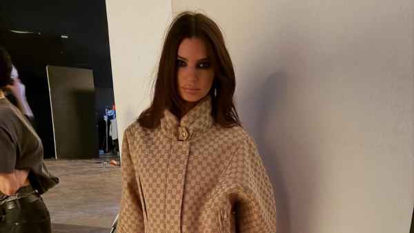 Emily Ratajkowski Goes Pantsless in Knee-High Gucci Boots, Matching Jacket and Bag