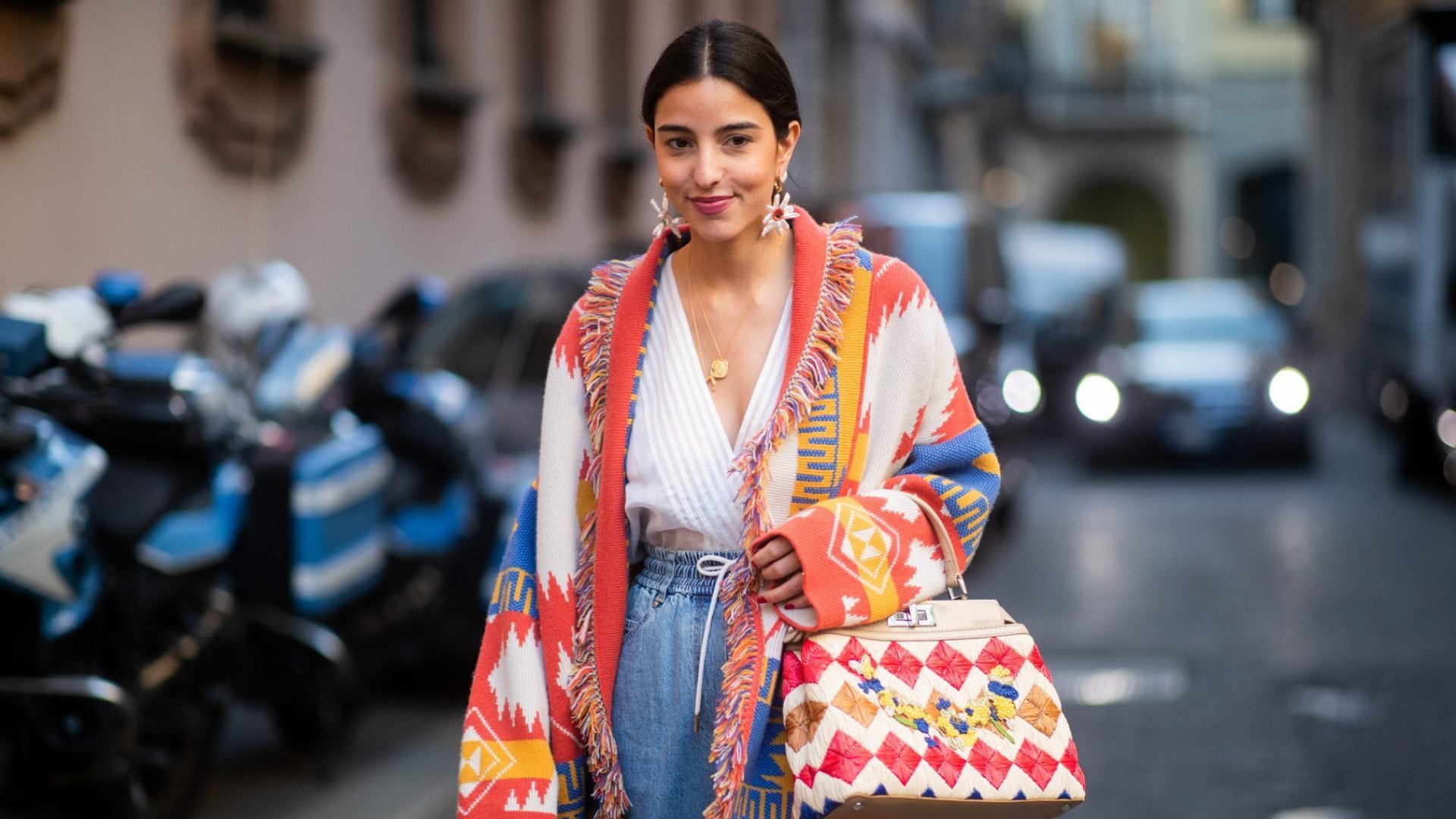MILAN, ITALY - FEBRUARY 21: Bettina Looney is seen wearing two tone denim jeans, Fendi bag, cardigan outside Vivetta on Day 2 Milan Fashion Week Autumn/Winter 2019/20 on February 21, 2019 in Milan, Italy. (Photo by Christian Vierig/Getty Images)