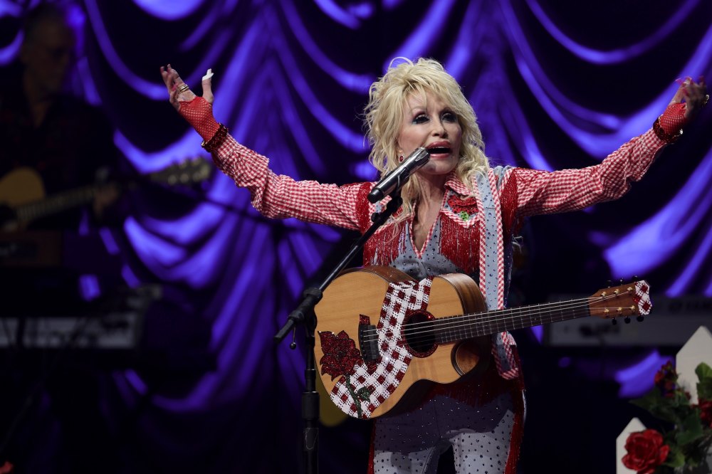 GettyImages-1386377639 Dolly Parton Has Secret Tattoos Quotes About Her Ink