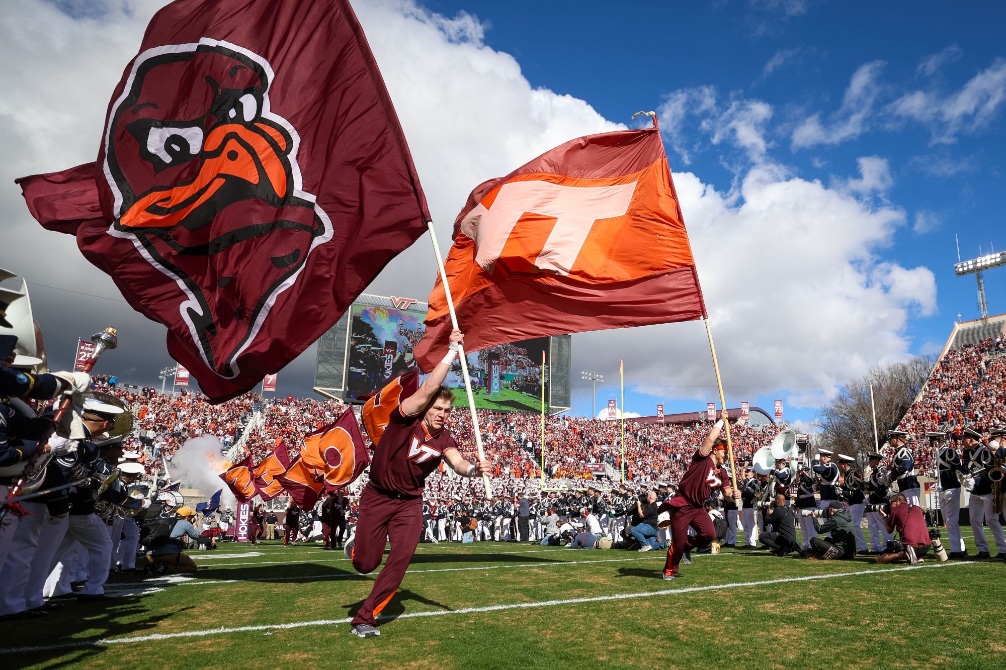 The spring football game on Saturday was delayed by nearly one hour after a skydiver crashed into the scoreboard at Lane Stadium