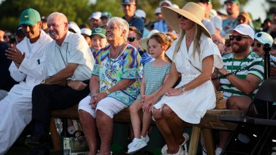 GettyImages-2271051471-Rory-McIlroys-Mom-Goes-Viral-With-Custom-Purse-Featuring-Sons-Grand-Slam-Headline