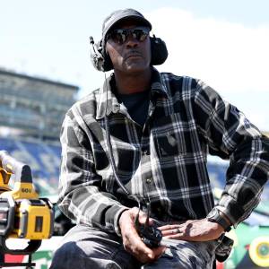 GettyImages-2271963335-Michael-Jordan-Goes-Viral-for-Choking-Kissing-Denny-Hamlin-During-NASCAR-Celebration