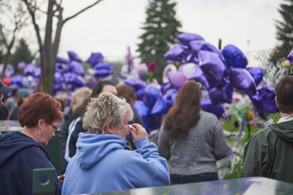 Prince fans crying outside Paisley Park after his death.