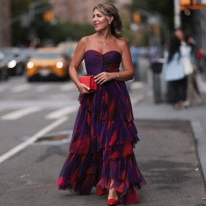 NEW YORK, NEW YORK - SEPTEMBER 07: Olga Ferrara seen wearing Leibish diamond necklace / diamond earrings / diamond bracelet, Hutch pink / purple pattern bandeau pleated long dress, Emanuel Ungaro red leather clutch bag and Scarlett Chase red suede leather pumps / heels, on September 07, 2024 in New York City. (Photo by Jeremy Moeller/Getty Images)