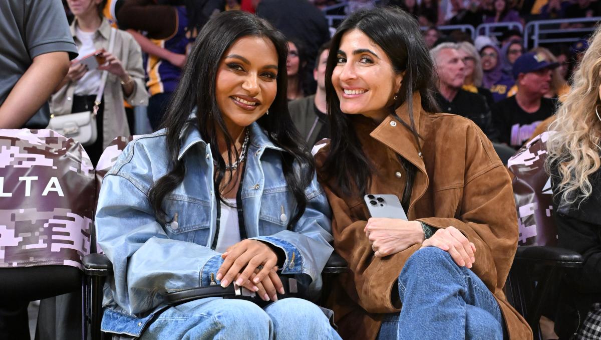 LOS ANGELES, CALIFORNIA - NOVEMBER 02: Mindy Kaling (L) and Parisa Jassim attend a basketball game between the Los Angeles Lakers and the Miami Heat at Crypto.com Arena on November 02, 2025 in Los Angeles, California. NOTE TO USER: User expressly acknowledges and agrees that, by downloading and/or using this Photograph, user is consenting to the terms and conditions of the Getty Images License Agreement. (Photo by Allen Berezovsky/Getty Images)