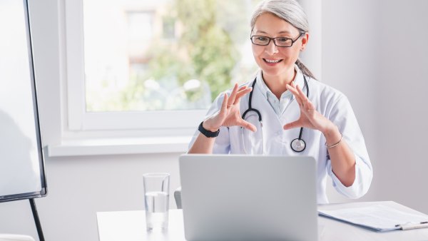 Telemedicine.,Middle,Age,Female,Doctor,Making,Video,Call,Or,Live