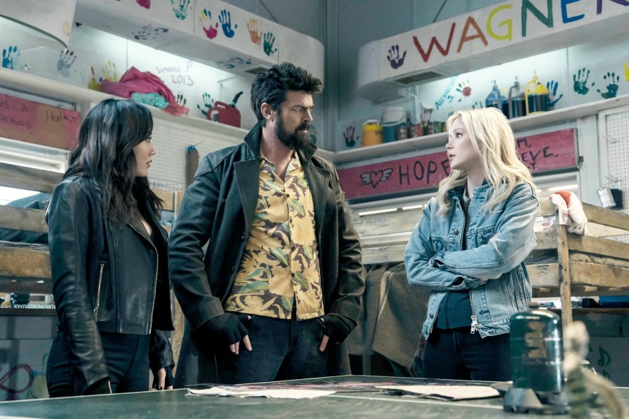 Karen Fukuhara (as Kimiko), Karl Urban (as Billy Butcher) and Erin Moriarty (as Annie January, aka Starlight) in The Boys season 5, episode 1
