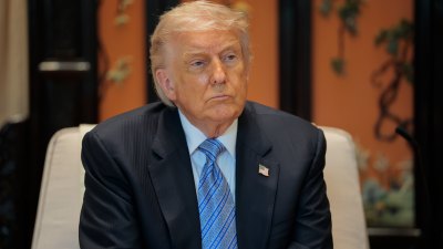 GettyImages-2275744077Donald-Trump-Puts-Stephen-Colbert-in-a-Dumpster-in-AI-Video.jpg