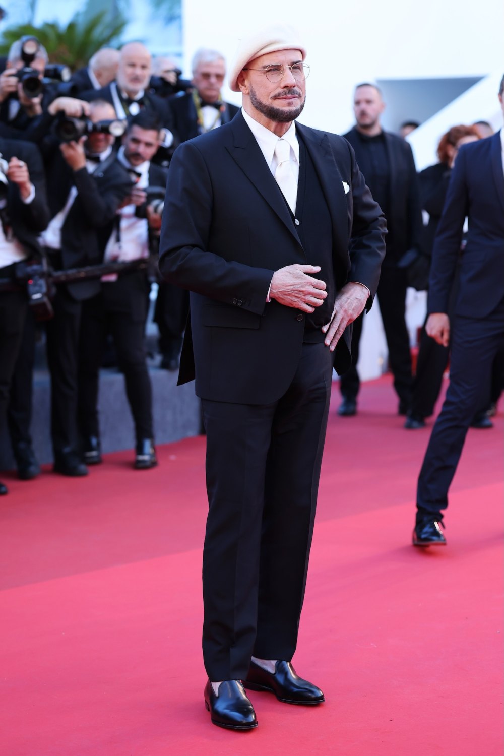 John Travolta on Viral Cannes Look With Beret and Glasses