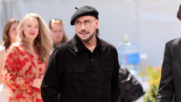 John Travolta on Viral Cannes Look With Beret and Glasses