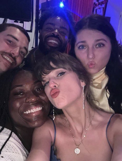 X-fan-selfie-2-Taylor-Swift-Snaps-Selfies-as-Travis-Kelces-Date-at-Wedding.jpg