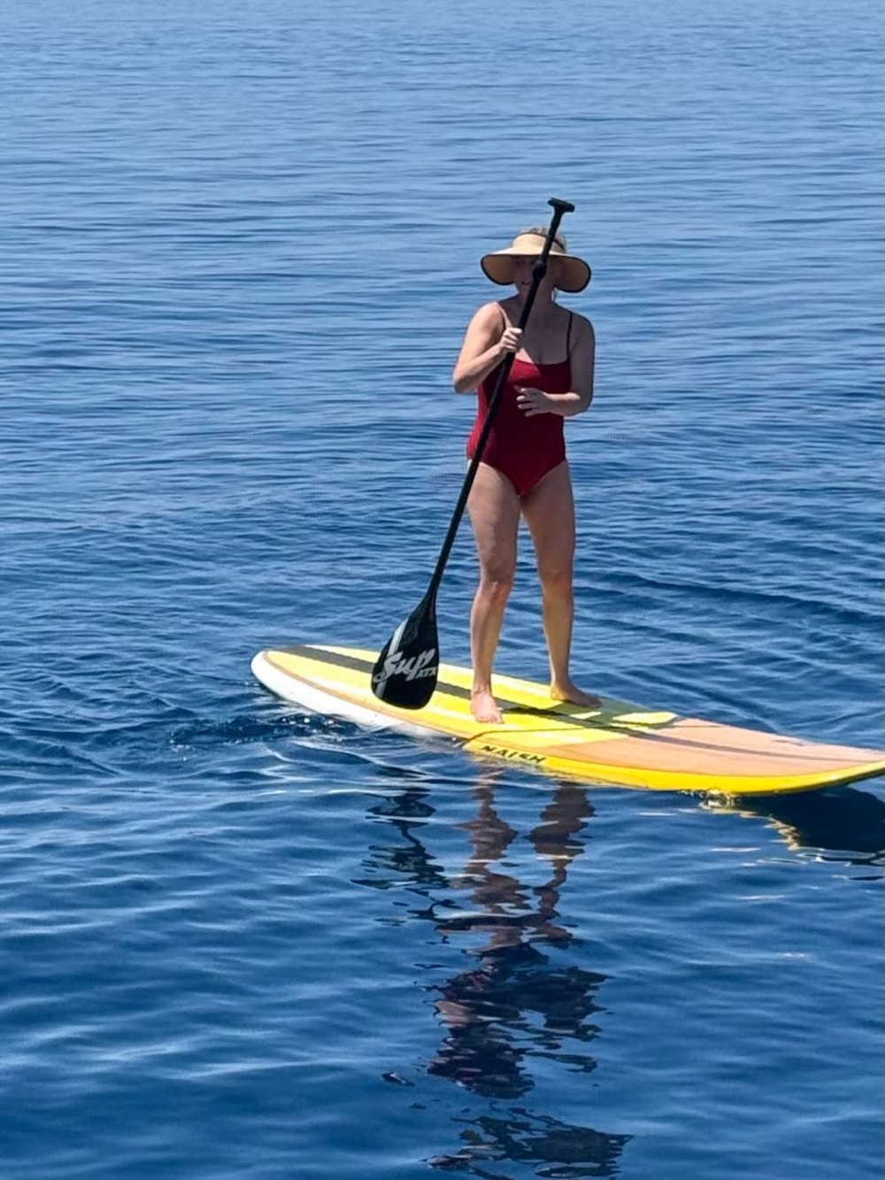 Amy Schumer Shows Off Body While Vacationing With Son Gene