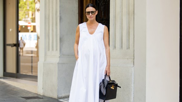 BARCELONA, SPAIN - JUNE 24: Zina Charkoplia wears white wide Dissh dress, Chanel ballerinas, black Hermes bag on June 24, 2025 in Barcelona, Spain. (Photo by Christian Vierig/Getty Images)