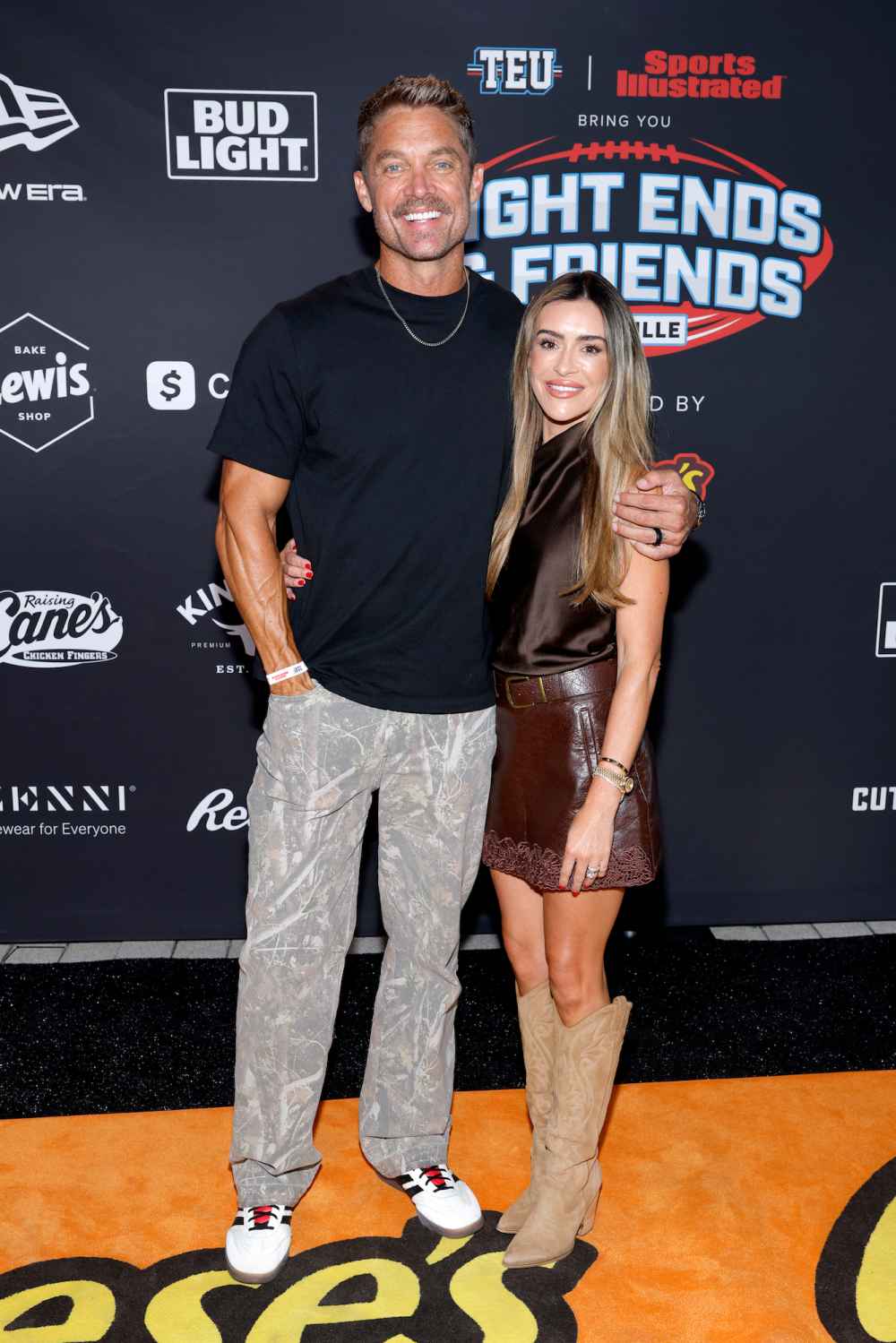 Brett-Young-and-Taylor-Mills-Young-GettyImages-2283032043