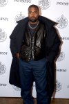 GettyImages-1186140733-North-West-and-Kanye-West-Matching-Wear-Gimp-Masks-in-Photos.jpg