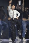 GettyImages-2265108901 Harry Styles Sparks Concern After Viral Video Shows Singer Choking on Water Collapsing on Stage