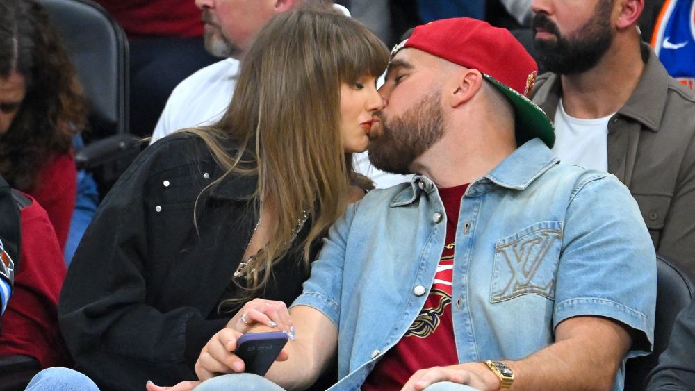 Travis Kelce Honors Taylor Swift With Romantic Movie Poster at L.A. Live Show