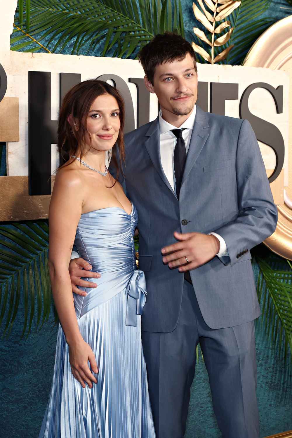GettyImages-2283356460-Millie-Bobby-Brown-Puts-Spin-on-Naked-Dress-Trend-While-With-Jake-Bongiovi.jpg