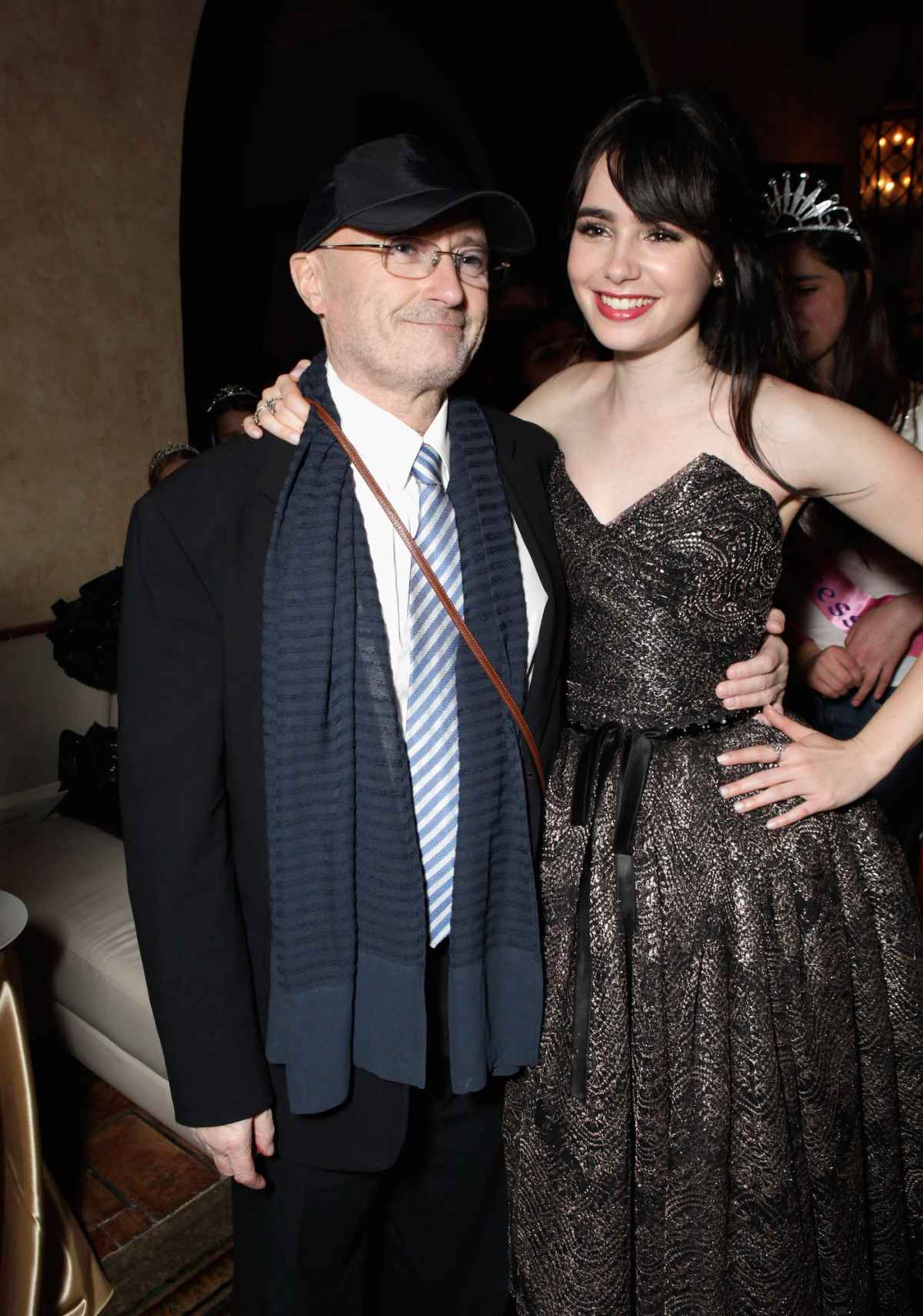 Phil-and-Lily-Collins-GettyImages-141504943