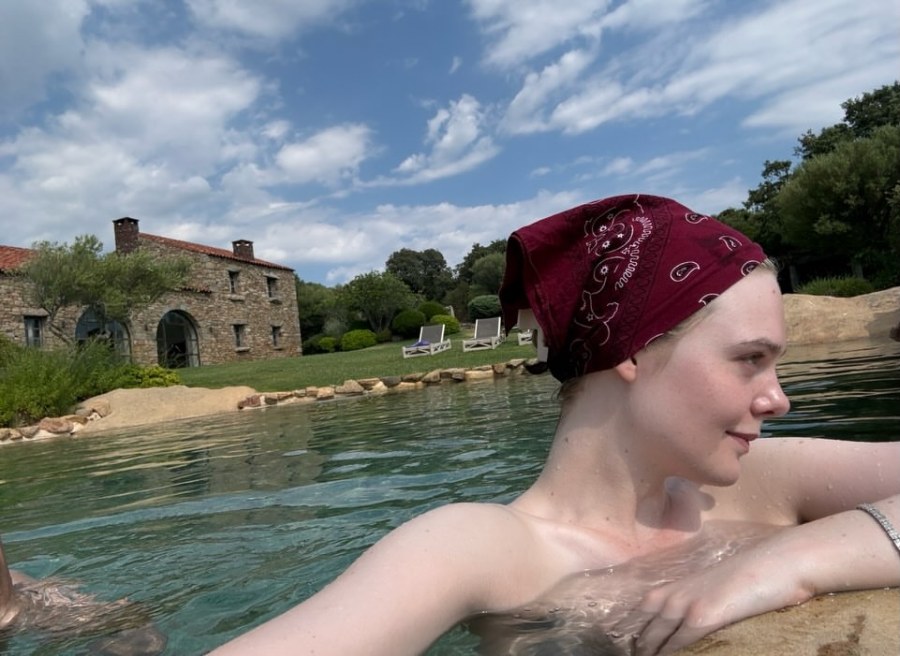 Elle Fanning Poses Topless in Cheeky Bottoms on Vacation