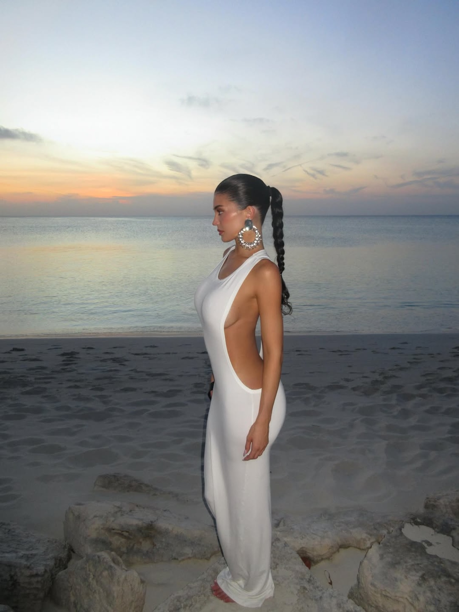 Kylie Jenner Flashes Sideboob in Body-Skimming Dress During Island Getaway