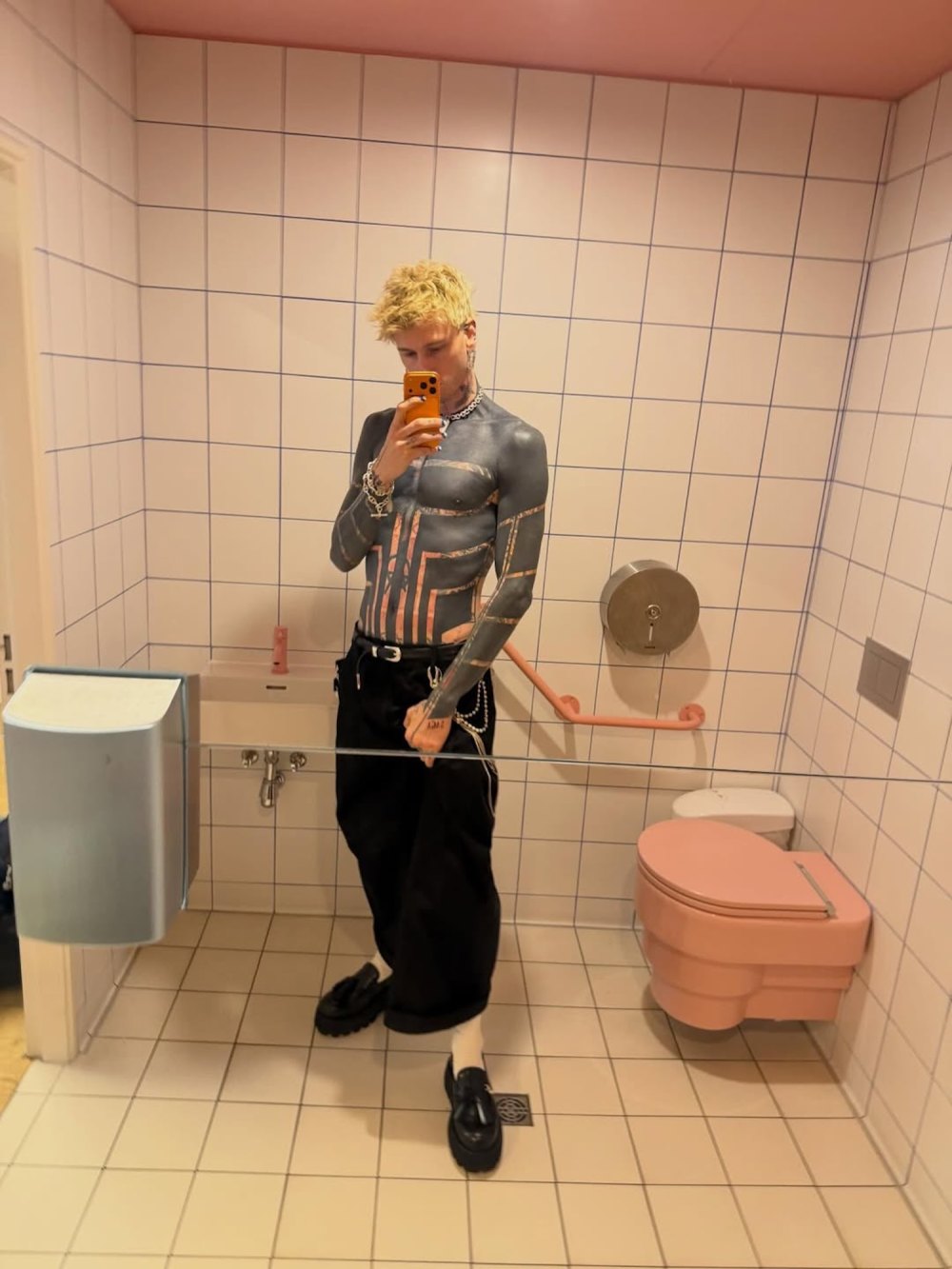 Machine Gun Kelly Says His Skin Turned 'Yellow' After Completing Intense Blackout Tattoo in 2 Months