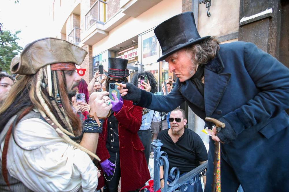 GettyImages-2287391954 Johnny Depp Looks Unrecognizable as Ebenezer Scrooge During Surprise SDCC Appearance
