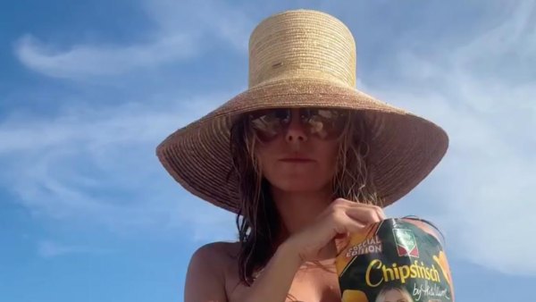 Heidi Klum Shows Off Her Curves While Going Topless on a Beach