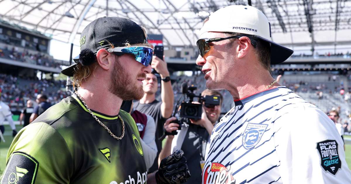 Logan Paul Claims He’s ‘Suing’ Tom Brady Over Slap at 2026 Fanatics Fest: ‘Mad Bc I Smoked Him In’