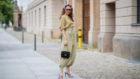 BERLIN, GERMANY - JULY 02: Alexandra Lapp is seen wearing vintage harem pants, a vintage silk blouse, Gucci foulard worn as a headband, Céline Audrey sunglasses, long Chanel earrings, black Chanel tweed bag 2.55, and black Gianvito Rossi Medea sandals during Berlin Fashion Week on July 02, 2019 in Berlin, Germany. (Photo by Christian Vierig/Getty Images)