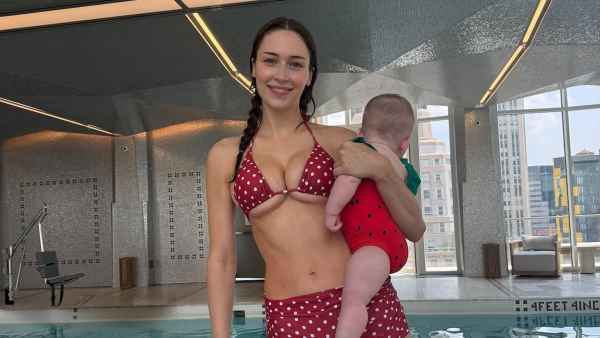 Elsie Hewitt Shows Off Her Curves in an Underboob-Baring Bikini While Teaching Scottie How to Swim