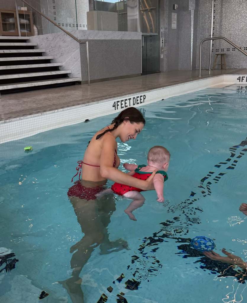 Elsie Hewitt Shows Off Her Curves in an Underboob-Baring Bikini While Teaching Scottie How to Swim