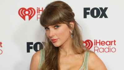 Taylor Swift Shows Off Haircut and Her Massive Ring in Floral Mini Dress During Night Out in London