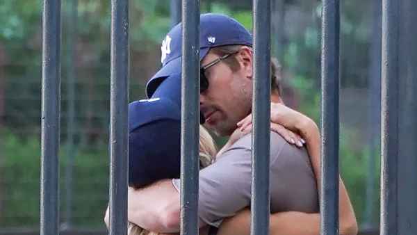 Glen Powell and Michelle Randolph Kiss PDA
