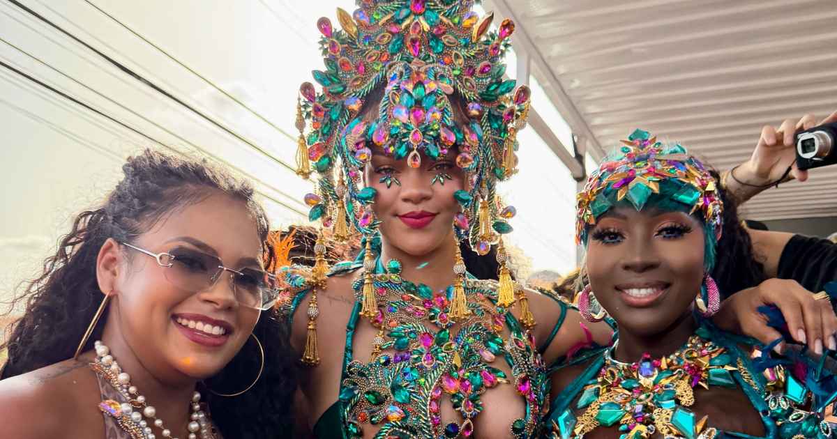 Rihanna Stuns in Barely-There Carnival Costume With Jewels, Feathers and Body Cutouts Rihanna Stuns in Barely-There Carnival Costume With Jewels, Feathers and Body Cutouts