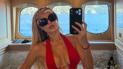 Brooks Nader Hilariously Jumps in Water Fully Clothed After Going Viral for Topless Moment With Dad