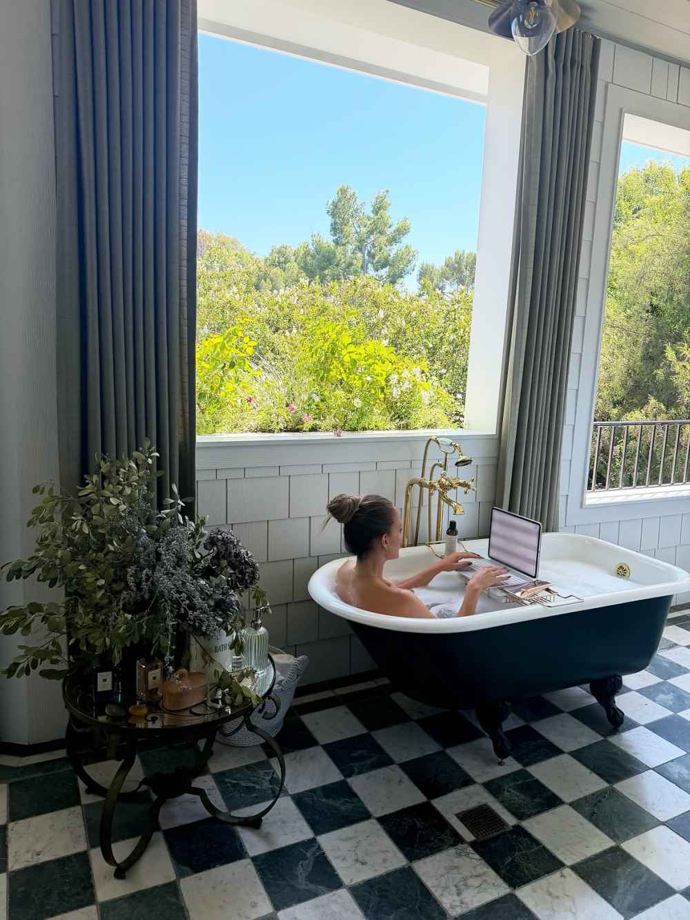 Jennifer Lopez Strips Down and Works From a Bathtub