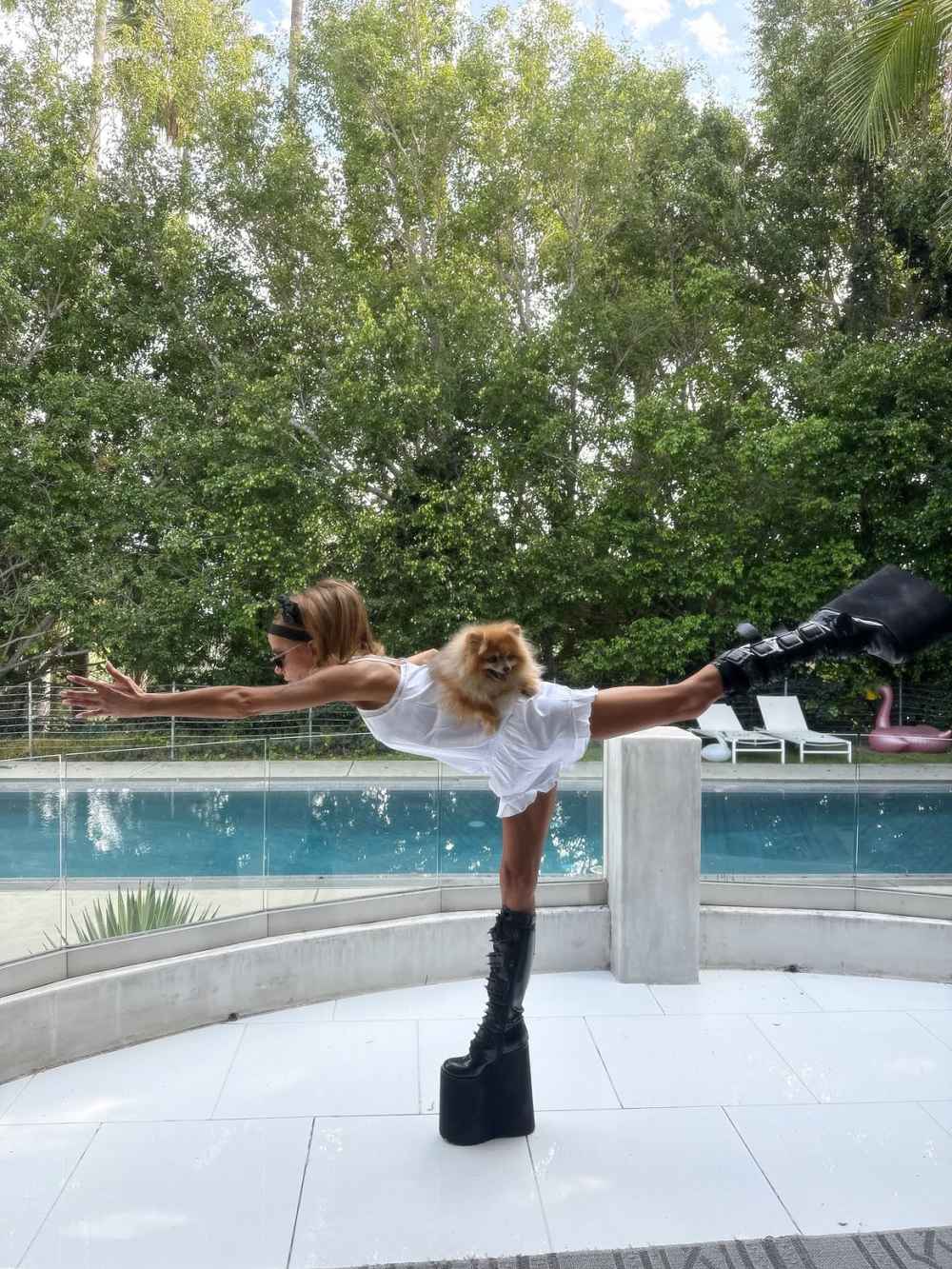 Kate Beckinsale Does Yoga in Sky-High Platforms With Her Pink-Furred Cat and Pomeranian on Her Back