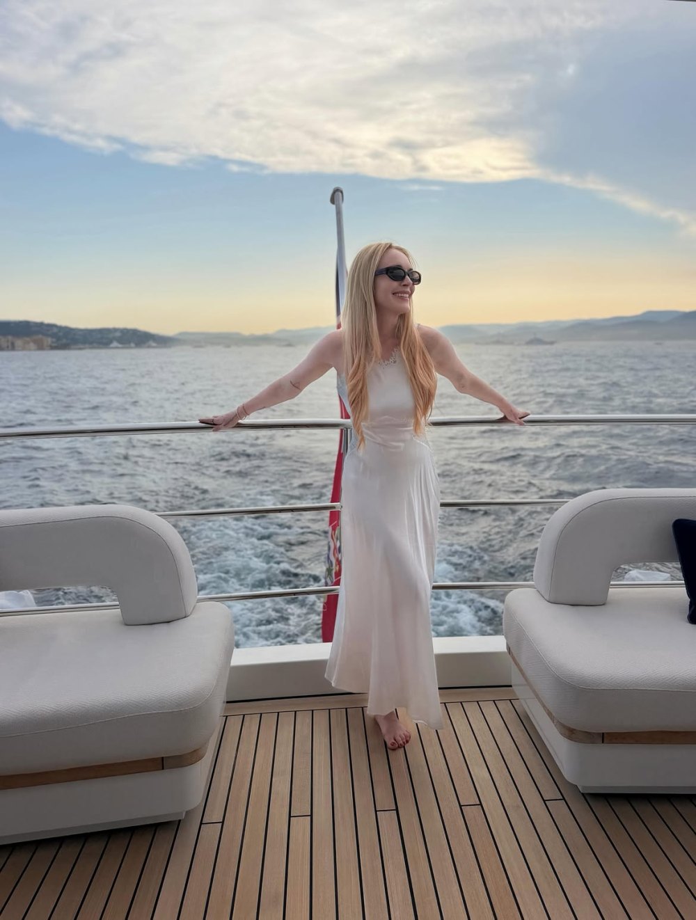 Lindsay Lohan Shows Off Timeless Swimsuit Style on a Yacht