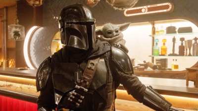 Pedro Pascal and Grogu in Star Wars: The Mandalorian and Grogu