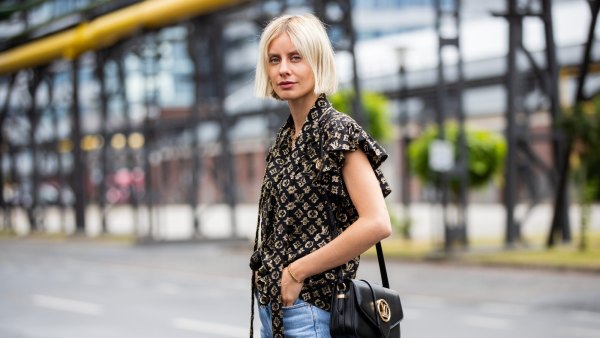 DUSSELDORF, GERMANY - JUNE 09: Lisa Hahnbueck is seen wearing Louis Vuitton logo prinz silk blouse, Goldsign jeans, Louis Vuitton Pont Neuf 9 bag on June 09, 2020 in Dusseldorf, Germany. (Photo by Christian Vierig/Getty Images)