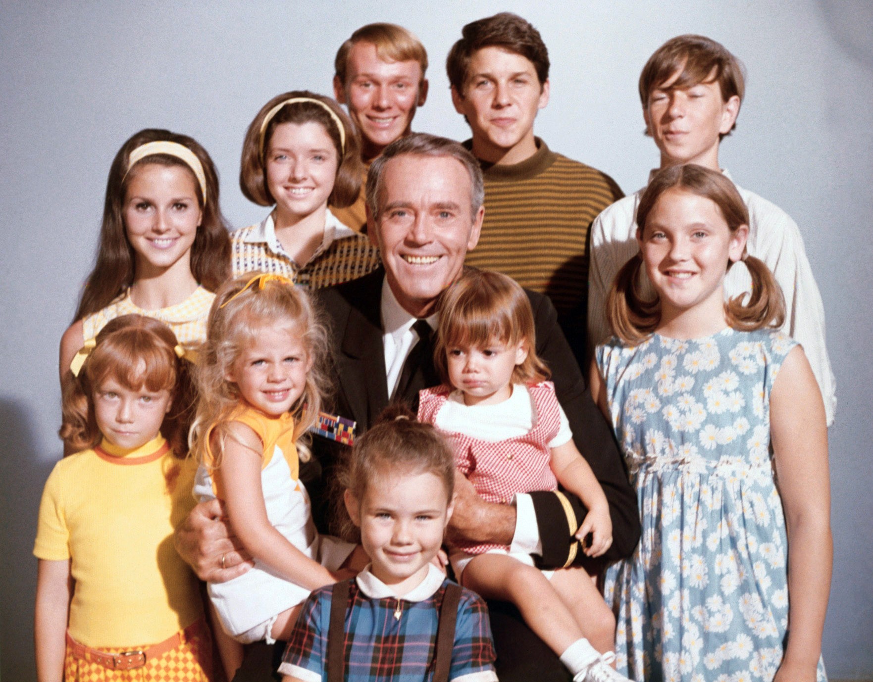 Henry Fonda; top 5 from left: Nancy Roth, Morgan Brittany (billed as Suzanne Cupito), Gil Rogers, Tim Matheson, Gary Goetzman; bottom 5 from left: Michele Tobin, Tracy Nelson, Maralee Foster, Stephanie Oliver, Holly O'Brien in Yours, Mine and Ours
